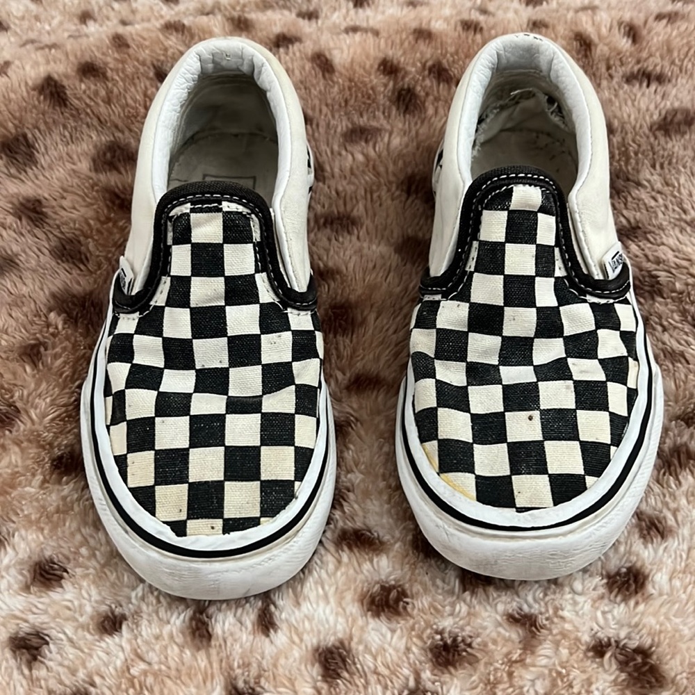 Size 11.5 vans black and white . Play condition.